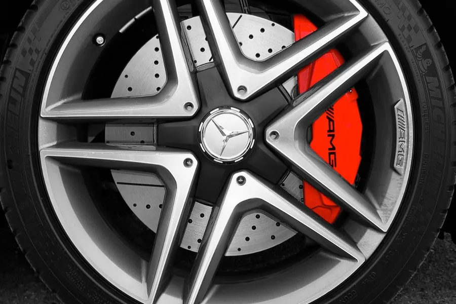 Close-up of an AMG alloy wheel with a red brake calliper