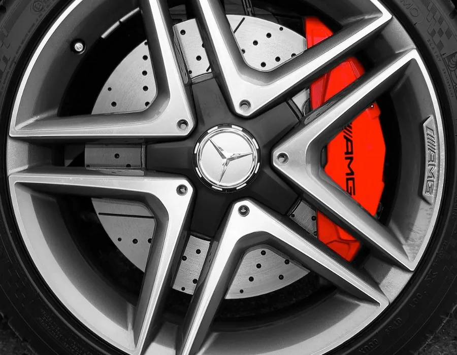 Close-up of an AMG alloy wheel with a red brake calliper